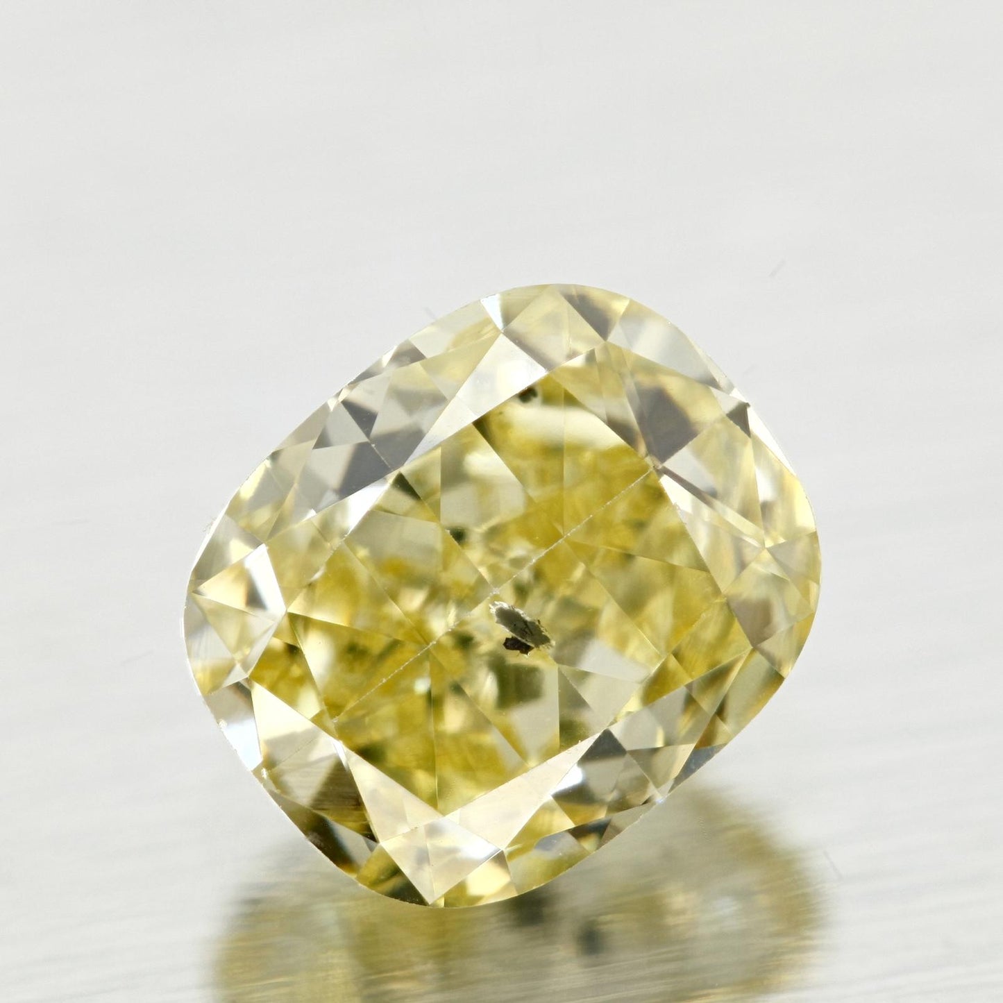 GIA 0.7 Fancy Yellow-I1 Cushion Diamond