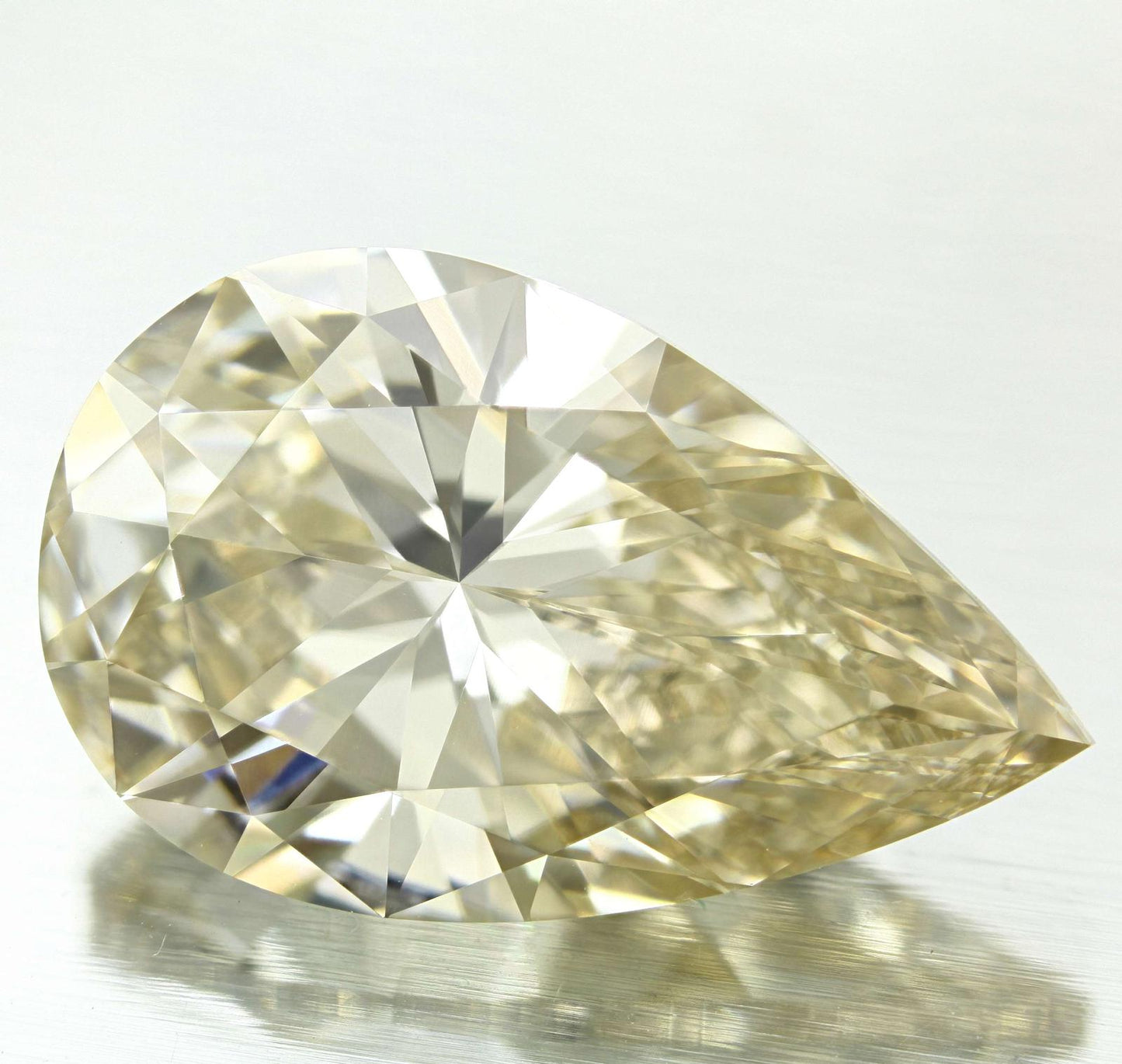 GIA 10.13 Fancy Light Yellow Brown-SI1 Pear Diamond