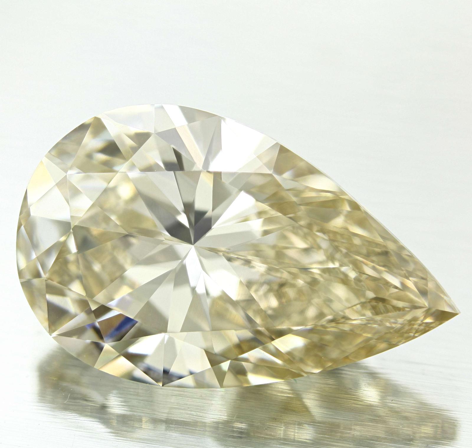 GIA 10.13 Fancy Light Yellow Brown-SI1 Pear Diamond