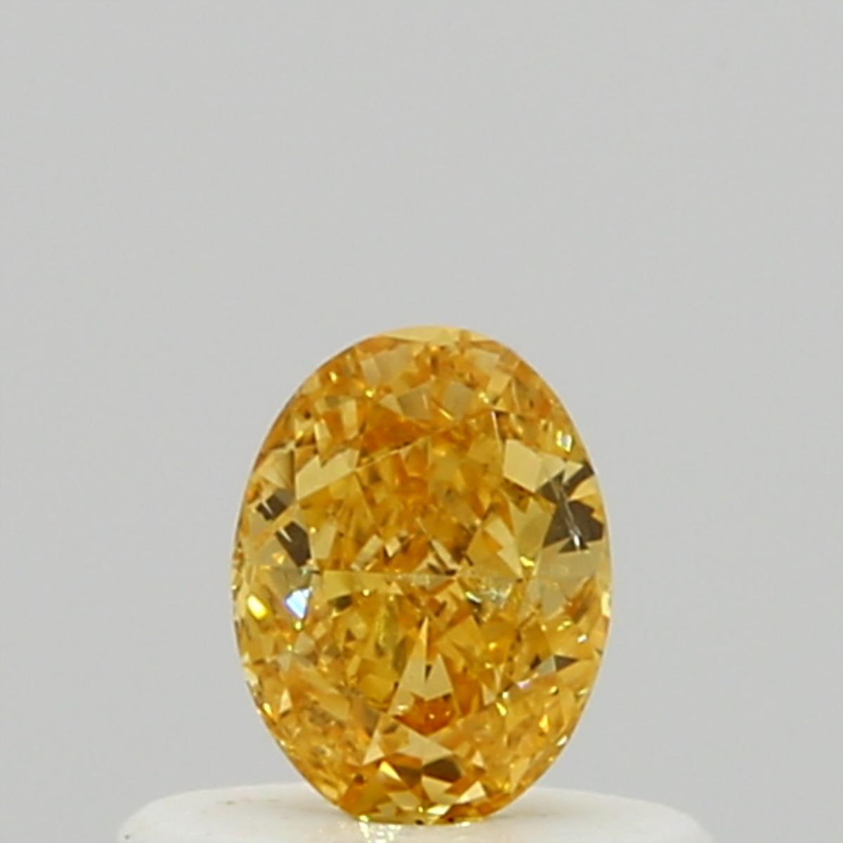 GIA 0.31 Fancy Vivid Yellow Orange-SI2 Oval Diamond