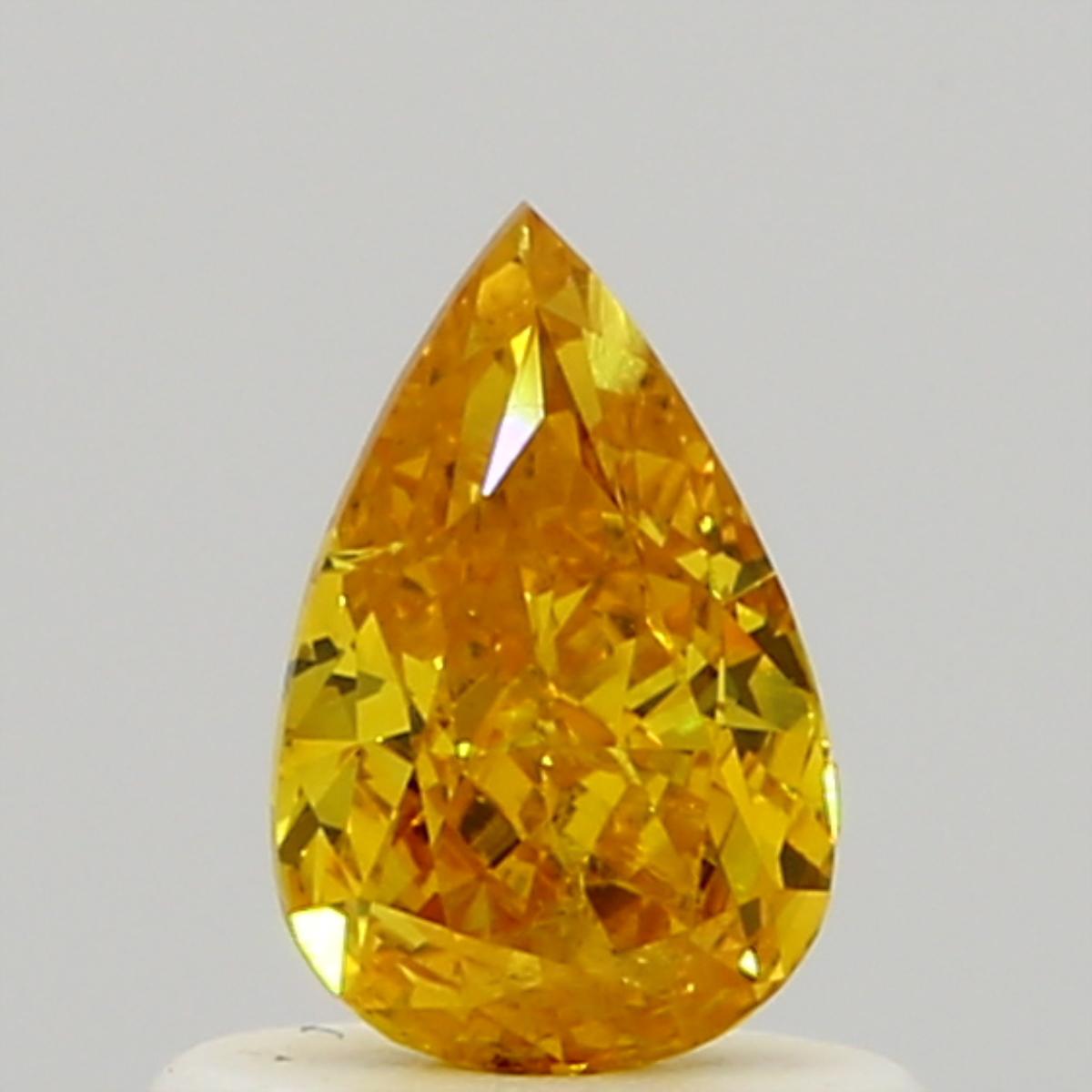 GIA 0.53 Fancy Vivid Yellow Orange-I1 Pear Diamond